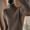 Suéter de punto para mujer 2026 grueso otoño e invierno manga larga capa base tejido suelto transfronterizo cuello alto nuevo color liso estilo coreano ropa de mujer