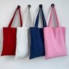 Bolsa de lona blanca y negra para hacer grafitis, pintada a mano, con logotipo, venta al por mayor de fábrica.