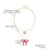 Joyería transfronteriza de San Valentín más vendida Aretes de flor de rosa roja Collar de corazón Conjunto Aretes de San Valentín europeos y americanos