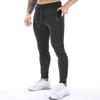 Calça Casual Masculina de Primavera e Outono Calça de Moletom Legging para Corrida Fitness Muscular Cor Sólida Bolso com Zíper Calça Esportiva