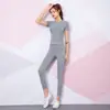 Suministro directo transfronterizo conjunto de dos piezas para gimnasio y yoga para mujer traje deportivo casual para niñas camiseta deportiva moderna mujer
