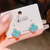 Pendientes de Flor de Cuatro Hojas de Zirconia Turquesa Imitación Retro de Aguja Plateada de Lujo Ligero de Gama Alta Pendientes Clásicos Retro Estilo Chino Nuevo