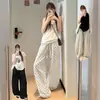Pantalones de Lunares Blancos para Mujer, Estilo Delgado de Verano, Nuevos Pantalones de Pierna Ancha de Algodón y Lino 2026, Ajuste Casual y Relajado, Estilo Perezoso, Pantalones de Lino con Dobladillo Curvo
