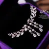 Corea del Sur Dongdaemun aretes de borla de hojas para mujer aretes de circonita aretes de aleación fabricantes de joyería al por mayor