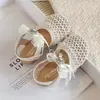 Sandalias de Diadema de Punto Hueco para Niñas 2026 Nuevo Verano Bebé Encaje Lazo Zapatos de Princesa Dulces Zapatos Individuales