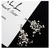 Pendientes de hilo de pescar con perlas y borlas largas y estrelladas de Corea del Sur, elegantes pendientes de personalidad sencilla y socialité.