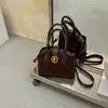 Bolso de hombro nuevo, elegante y versátil 2026, un bolso de mano mate de alta gama, de nicho, bolso de axila y bolso cruzado