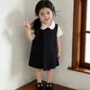 Vestido para Niña 2026 Verano Nuevo Estilo Moda Bebé Niña Cuello de Muñeca Moda Chaleco Cruzado Vestido Conjunto de Dos Piezas