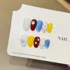 Flor Pequeña Cremosa Azul Súper Brillante Ojo de Gato Estilo Corto Uñas Portables Completamente Hechas a Mano Pegatinas de Arte para Uñas Completamente Hechas a Mano Piezas de Uñas Postizas