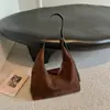 Bolso tote grande de moda coreana 2026, estilo niche retro, un bolso de hombro versátil con un toque de alta gama