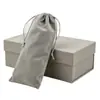 Bolsa de terciopelo gris con cordón en stock para guardar joyas, bolsa a prueba de polvo para auriculares, bolsa de terciopelo para guardar regalos