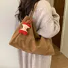 Otoño e Invierno Nuevo Estilo Gamuza Textura Mate Estilo Perezoso Coreano Nicho Casual Gran Capacidad Color Sólido Bolso de Hombro Tote