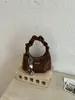 Bolso bandolera tipo cesta tejido de cadena estilo coreano para mujer, nuevo modelo 2026, bolso de mano de cesta dulce y juvenil de nicho