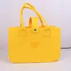 Bolsa de feltro de urso nova da Net Red, bolsa de mão para mamãe, bolsa tote de desenho animado, pronta entrega, atacado, bolsa de compras simples e portátil
