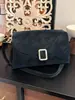 Bolso pequeño cuadrado único y elegante para mujer, nuevo modelo de primavera 2026, bolso de hombro cruzado simple y a la moda para el trabajo y el uso diario