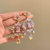 Pendientes florales vintage con incrustaciones de diamantes, sensación de lujo ligero y alta gama, estilo de corte retro, elegantes pendientes de noche