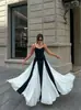 Vestido de tirantes ajustado de color contrastante blanco y negro, estilo francés elegante, para mujer, nuevo de primavera 2025, transfronterizo europeo y americano