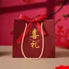 Bolsa de regalo festiva roja transfronteriza, bolsa para empaquetar dulces de boda, bolso de mano para recuerdos de boda, bolsa de regalo estampada en oro