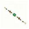 Pulsera multicuenta con cuentas cilíndricas verdes, combinada con sándalo y perlas naturales, con un pequeño colgante de oro con un amuleto de la fortuna, en un nuevo estilo chino