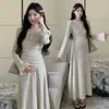 Nuevo Vestido Largo Rayado con Capucha para Mujeres Embarazadas Estilo Perezoso Otoño e Invierno que Cubre el Vientre Aspecto Adelgazante y Falda de Maternidad Dulce para Mujeres