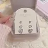 Pendientes Coreanos y Japoneses de Nuevo Estilo con Forma de Corazón Dulce, Lujo Ligero y Sensación de Alta Gama, Set Versátil de Tres Pares, Pendientes de Temperamento Suave y Delicado