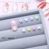 Decorações de Arte para Unhas Florzinhas Mistas de 8 Cores Resina Colorida Pequenas Flores Acessórios para Unhas Flor de Cinco Pétalas Materiais DIY Atacado