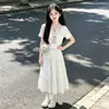 Conjunto de Verão para Meninas 2026 Novo Estilo Estilo College Manga Curta Elegante Gola Lapela Top e Saia Conjunto de Duas Peças