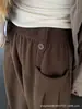 Pantalones de pana color café de pierna ancha para mujer Otoño 2026 Nuevo diseño coreano con sentido de la moda Pantalones banana banana ajustados de cintura alta para petite