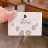 2025 Novas Brincos de Flor de Três Pétalas com Zircônia Cor de Fogo Conjunto de Três Pares Estilo Luxo Acessível Feminino Brincos Exquisitos de Alta Qualidade Conjunto de 6 Peças