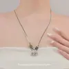 Collar Colgante de Elefante Pequeño Estilo Étnico para Mujer Modelo Nuevo 2026 Cadena de Suéter Estilo Chino Nuevo Accesorio de Cuello Simple y Elegante para Sudadera