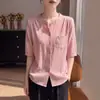 Cárdigan de punto con cuello redondo de manga corta para mujer, color liso con bolsillos, blusa simple plisada, nueva colección Primavera/Otoño 2026, transfronterizo