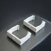 Produto de grande sucesso de vendas internacionais: Conjunto de 2 Peças de Suportes Brancos para Tomadas para Uso Doméstico, Fixadores de Tomada de Parede Tipo Perfurador, Atacado