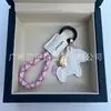 Dinero en el Caballo Cuero de Vaca Creativo Exquisito Casual Regalo de Pareja Bolso Lindo Colgante Llavero de Coche Llavero
