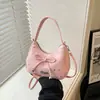 Bolso de mano ligero estilo coreano para mujer, nueva colección 2026, con diseño de lazo, chic, versátil, moderno y dulce, disponible como bolso de hombro o bolso cruzado, al por mayor