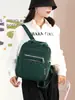 Mochila de Nylon 2026 Bolso de Mano Estilo Europeo y Americano para Mujer Mochila Cuadrada Pequeña Bordada Acolchada para Estudiantes Universitarias