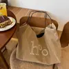 Bolsa de mano casual estilo coreano para mujer, nuevo modelo 2026, bolsa de lona de mezclilla de gran capacidad, bolso de hombro para el trabajo, bolsa simple y versátil