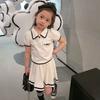 Conjunto Casual Infantil 2026 Verão Nova Moda Roupas Esportivas para Meninas Manga Curta Saia Curta Conjunto de Duas Peças Fino Estilo Tendência