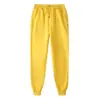 18 colores pantalones casuales para hombre color liso pantalones largos juveniles modernos tiro medio pantalones deportivos pants de chándal en stock blanco