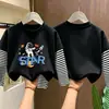 Camiseta de manga larga para niño, imitación dos piezas, algodón puro, nuevo estilo otoño 2026, para niños mayores, top básico para primavera y otoño