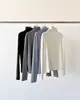 En Stock Invierno 2025 Nuevo Coreano Dongdaemun Ou*Ce Elegante Color Sólido Cuello Alto Manga Larga Camisa Base Top para Mujer