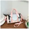 2026 Nuevo Bolso Redondo Cilíndrico de Bloques de Color de Moda Bolso de Mano Hombro Cruzado Bidireccional Multifuncional Casual Versátil para el Trabajo Bolso de Mujer Bolso de Mamá