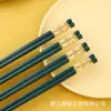 Palillos públicos comerciales de alta calidad antideslizantes antihongos resistentes a altas temperaturas palillos públicos palillos de aleación palillos con carácter Fu artículos domésticos originales palillos Verde