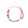 Jiangshan pitoresco DIY corda de mão feminina pulseira de corda vermelha tecida à mão infantil vestível contas de transferência douradas corda de mão flor de pêssego