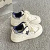 Zapatillas Deportivas de Entrenamiento Alemanas Retro de Nicho para Mujer Primavera/Otoño 2026 Nuevas Zapatillas Deportivas Casuales Transpirables Gato Pequeño Zapatillas de Tabla Zapatos Blancos