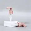 El fabricante suministra bombas de plástico para champú y gel de ducha, botellas de desinfectante de manos de rosca 24, cabezales de bomba de presión externa de resorte blanco