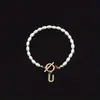 Pulsera de Moda de Venta Caliente Transfronteriza 2026 con Diamantes y 26 Letras, Pulsera de Perlas de Imitación Ovaladas, Disponible para Venta al por Mayor para Mujeres
