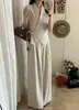 Conjunto de Verano Estilo Coreano con un Diseño Elegante Estilo Francés, Top sin Mangas de Color Sólido con Diseño de Botones Diagonales + Conjunto de Pantalones Anchos Adelgazantes