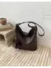 Al por mayor transfronterizo 2026 nuevo de gran capacidad textura tejida diseño de nicho bolsa de mano casual de un solo hombro bandolera bolsa para mujer