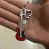 Colgante de alta calidad chapado transfronterizo dedicado y2g chica hot guitarra retro moderno estrella de cinco puntas bolsa de nicho colgante de llave