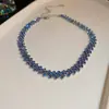 Traje de collar y pendientes de diamante ovalado europeo y americano exagerado luz de lujo alta gama cadena de clavícula nicho moda joyería al por mayor